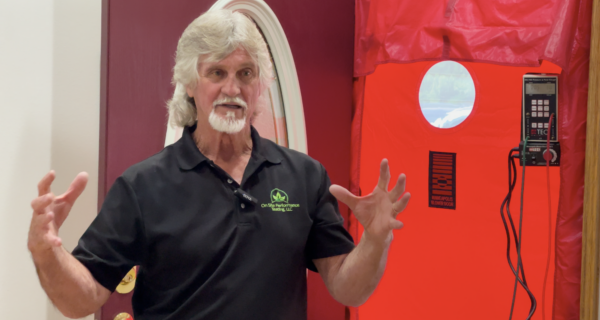 Dave talking in front of blower door