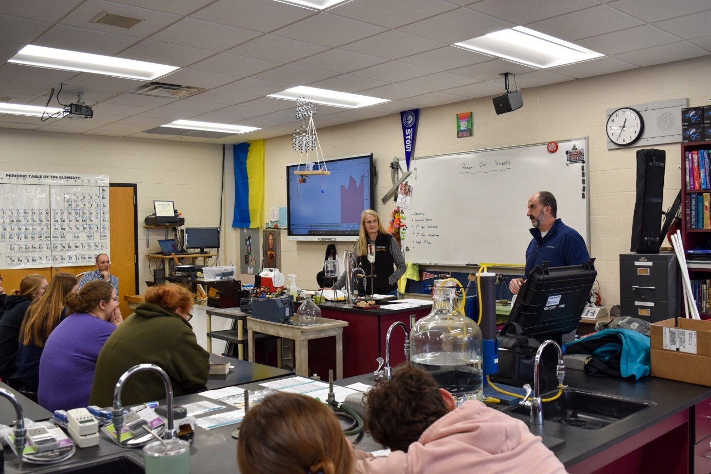 Energy Advisor talking with students