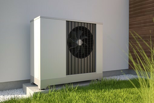air source heat pump outside in summer