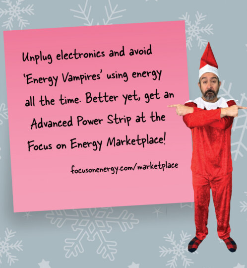 Person in a red elf costume and Santa hat stands beside a pink note on unplugging electronics and using a power strip, on a blue snowflake background.