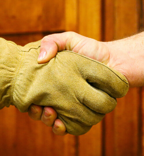 Handshake with work glove