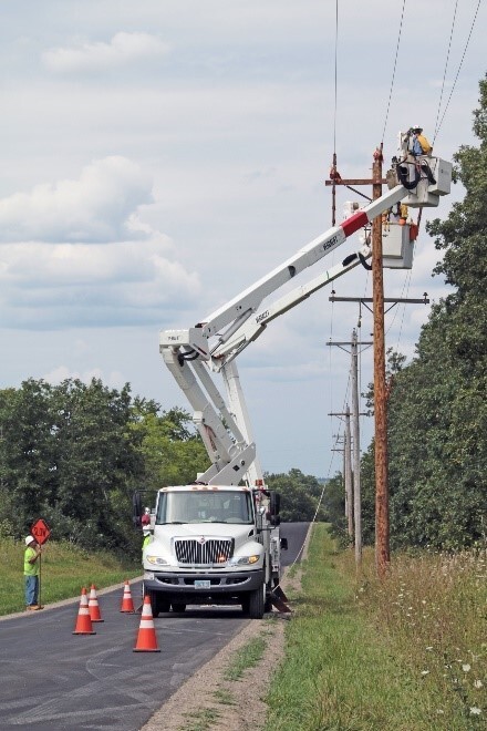 Lineworkers Fixing Power Line