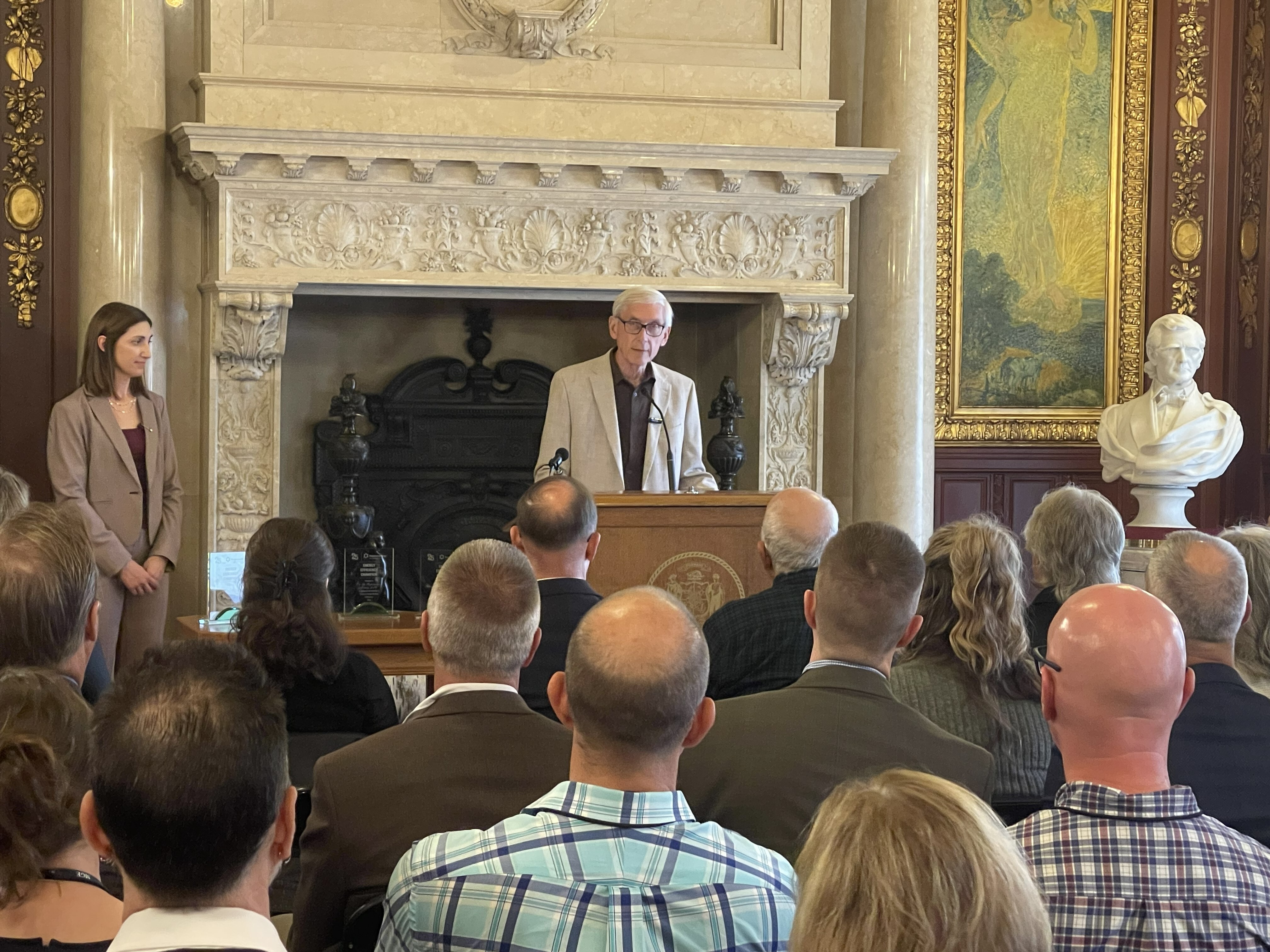 Governor Evers at State Capitol at a podium