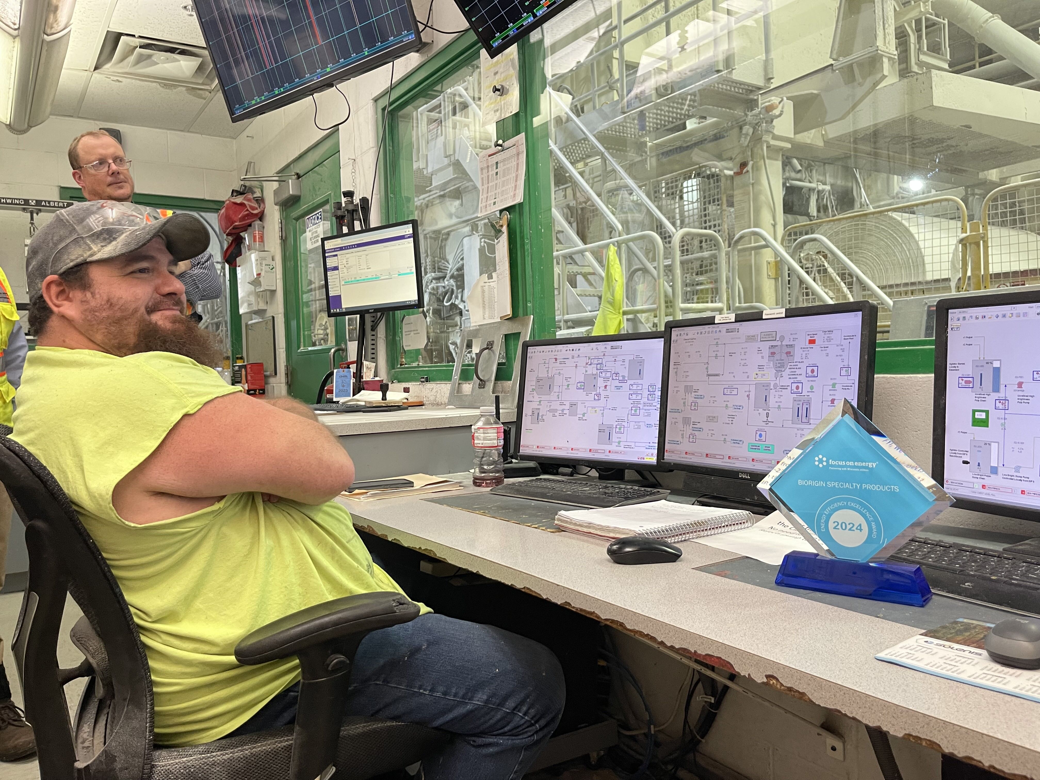 Biorigin Worker on Energy Team with award