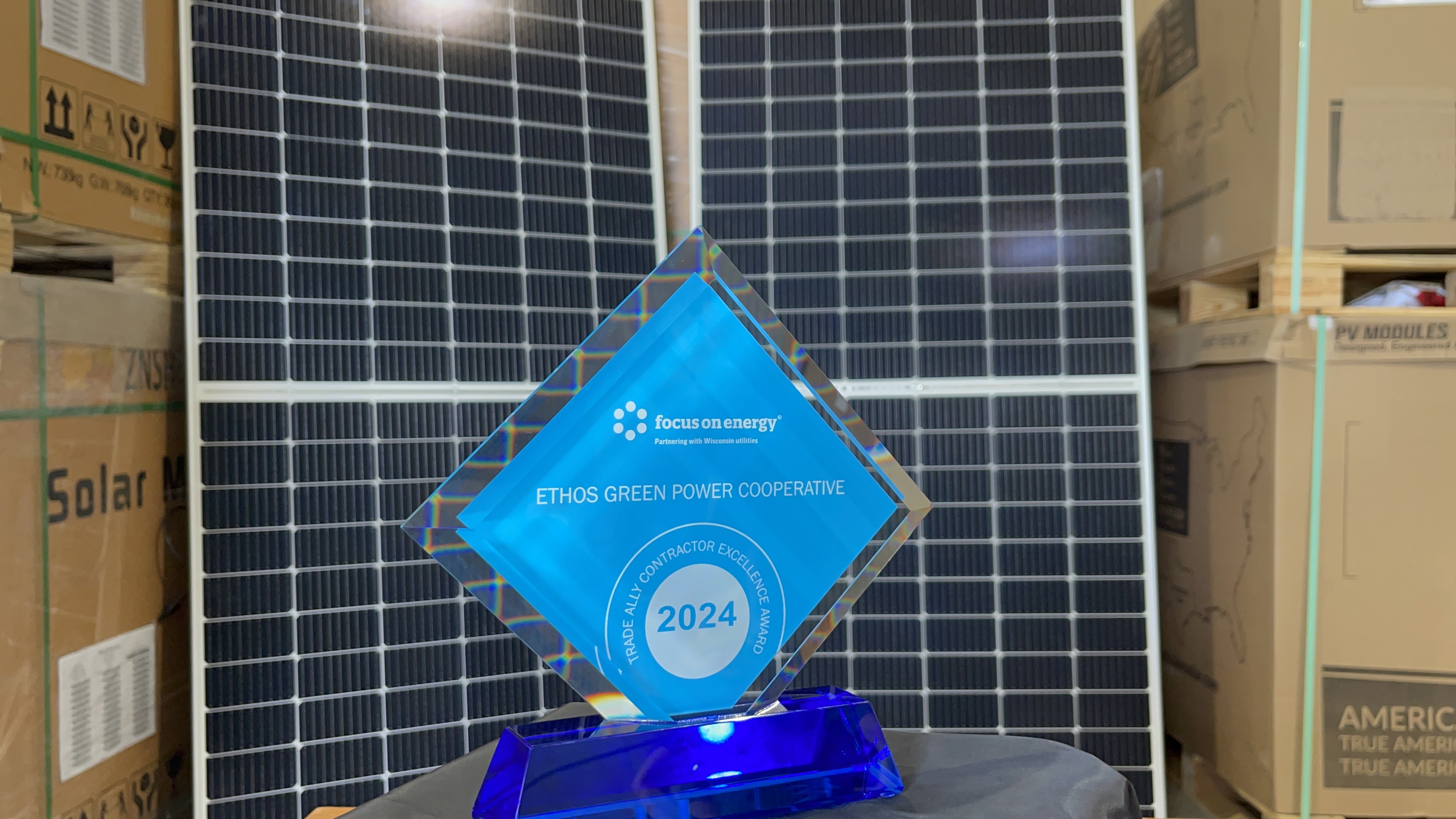 Ethos Award With Solar panel behind